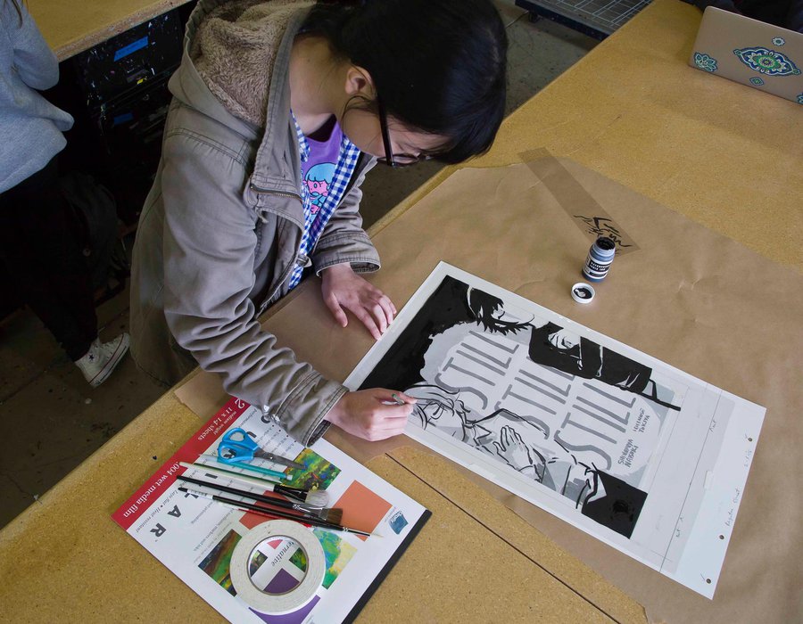 Illustration student painting a graphic poster_Illustration Hero_MB