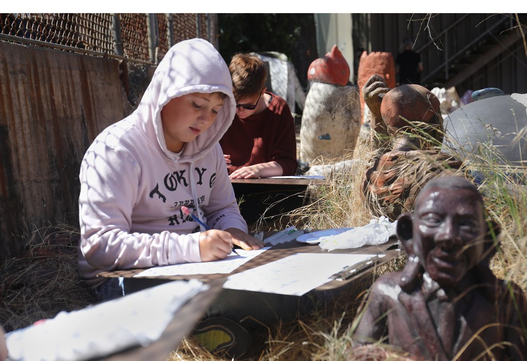 YASP students drawing in the Sculpture Garden at CCA