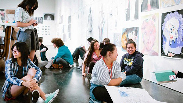 High school students practicing figure drawing during special studio course_special programs feature_MB