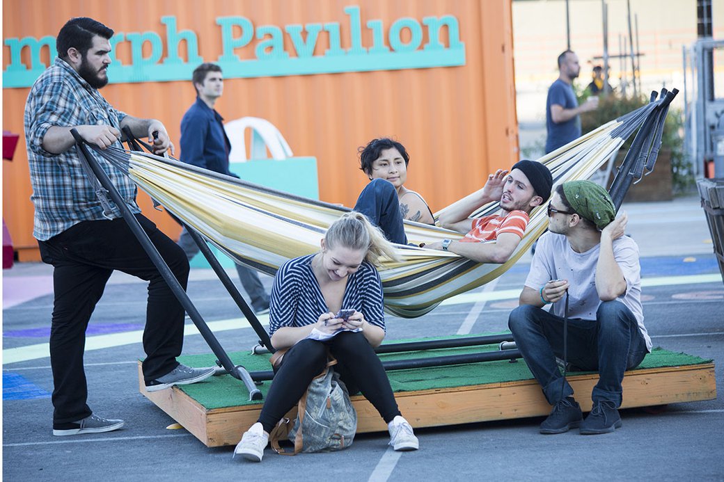 A group of students hang out on CCA's Backlot.