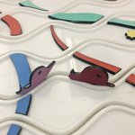 A close-up view of a board game with colorful pieces.