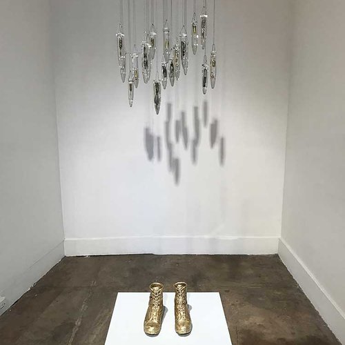 The presence of stillness is golden in this glass installation by Brett Franklin.