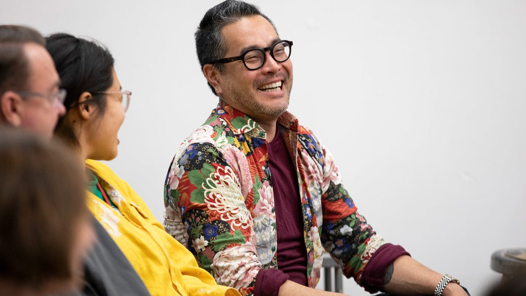 Curtis Arima laughing at a Ceramics meeting