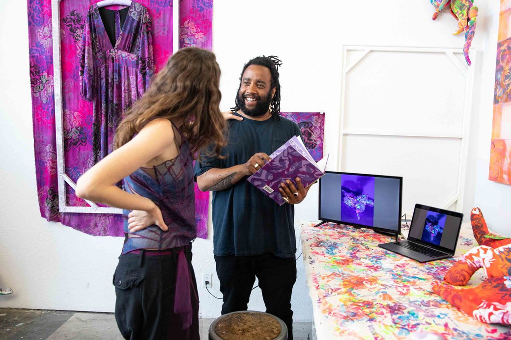 Students socializing during the MFA open studios.