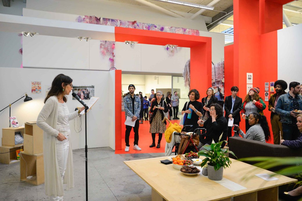 MFA writing student reading her work to an audience at CCA.