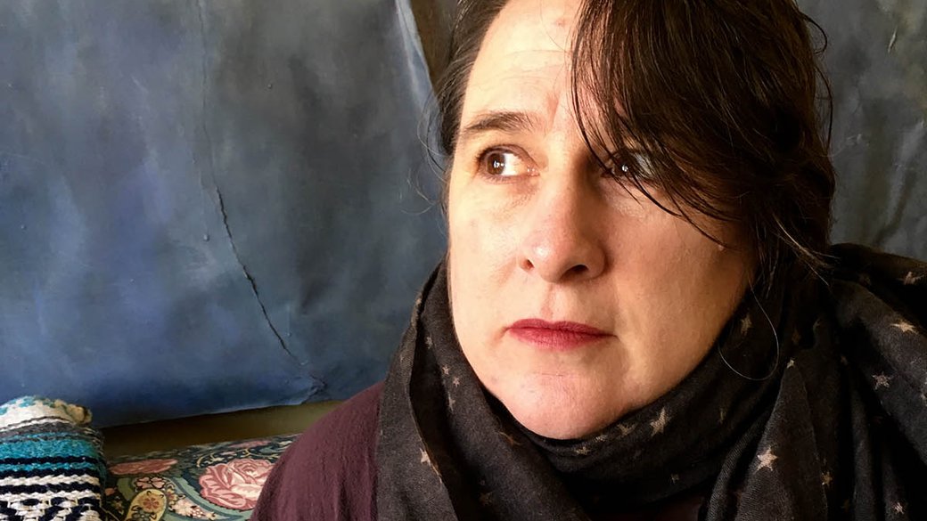Portrait of Kim Shuck, Poet Laureate of San Francisco, CA and CCA diversity studies faculty.
