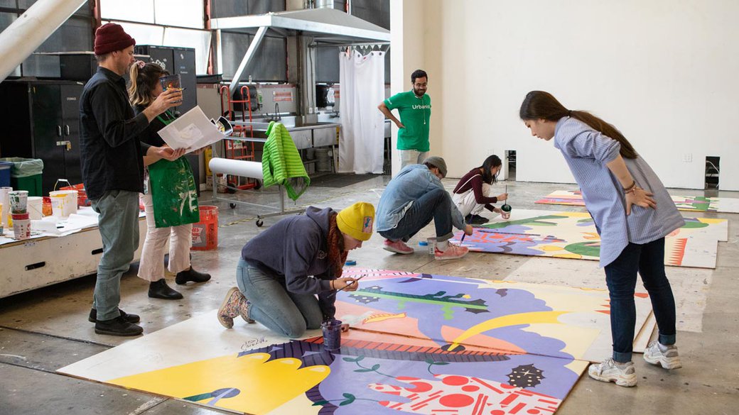 critical studies students working on their YBCA mural panels