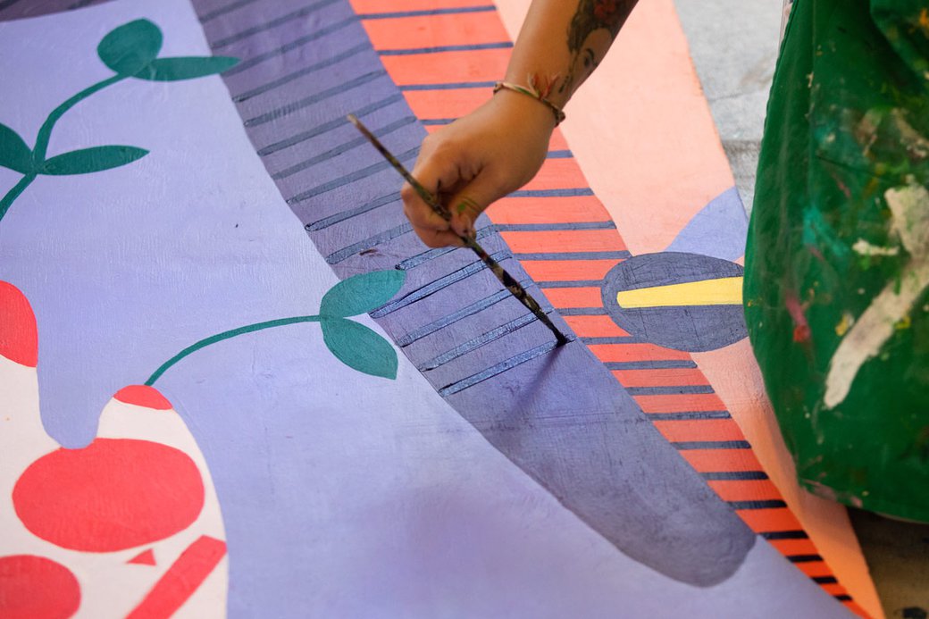 Student working on mural for YBCA install.