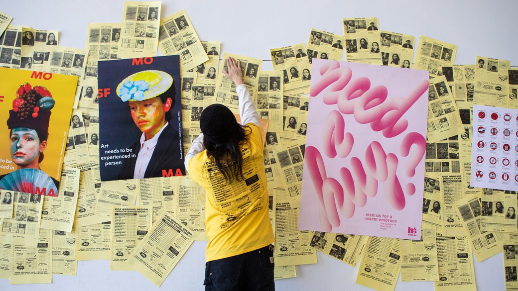 A graphic design student works on his presentation.