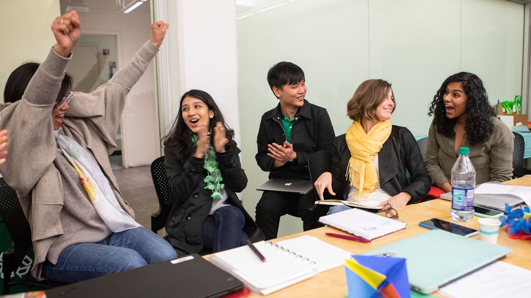 dmba students laughing during a weekend class