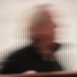 An out of focus photo of gallery owner Anthony Meier.