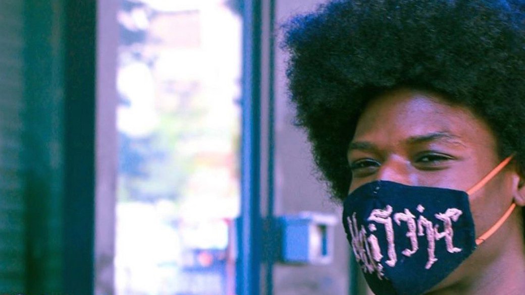 Student Bueli Njheri’s embroidered face mask