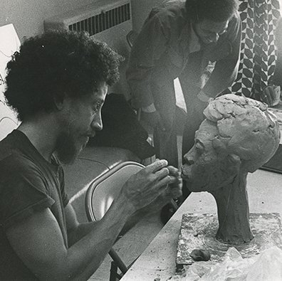 Sculpting in clay, 1970s.