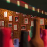 Macon Reed, Eulogy for the Dyke Bar 2015, Plastic and digital photo reproductions Dimensions varies 20 plastic frames, Wayfarers Gallery, New York, NY, 2015 .jpg