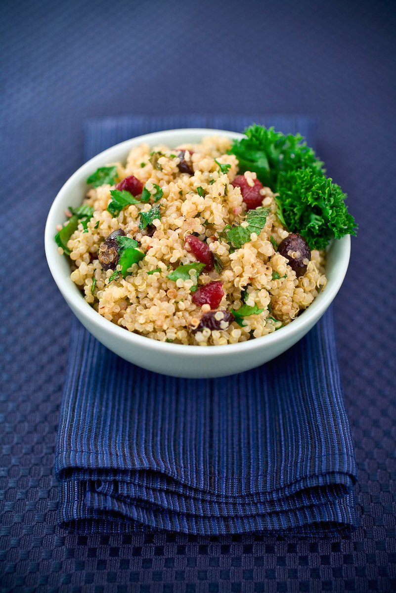 Healthy vegetarian salad of quinoa, cranberries and mint.