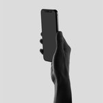 Image of hand holding a cell phone.