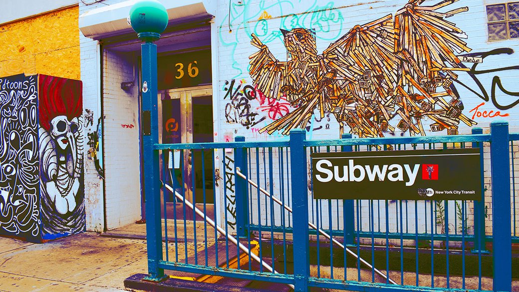 Photo of sidewalk entrance to New York subway