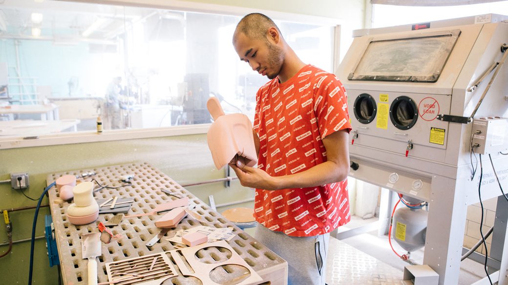 Student working in the Industrial Design sanding room