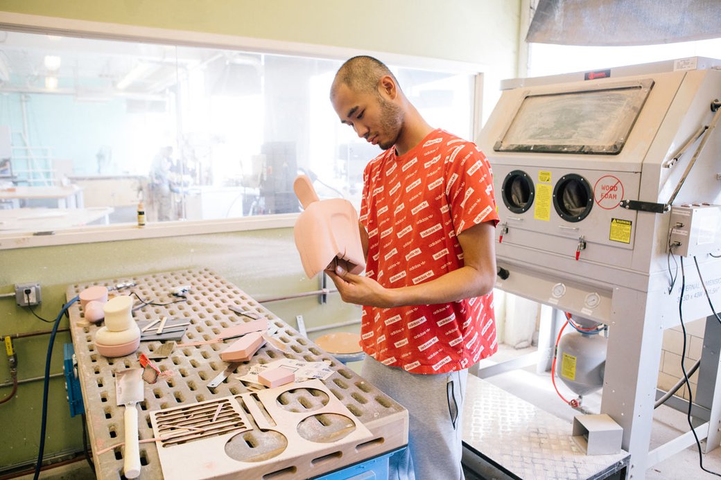 Student working in the Industrial Design sanding room.