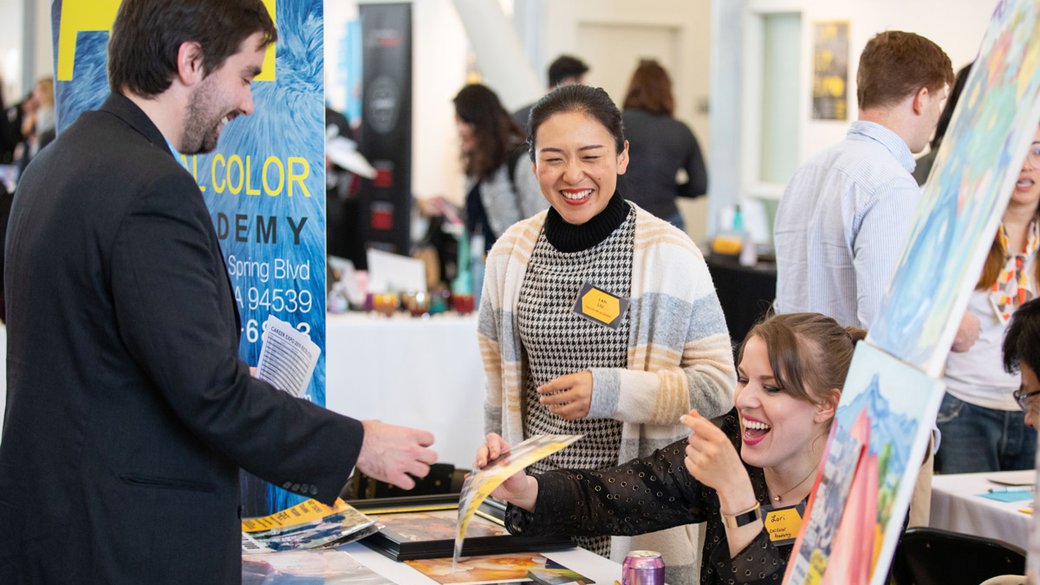 Students connecting with industry representatives at the career fair.
