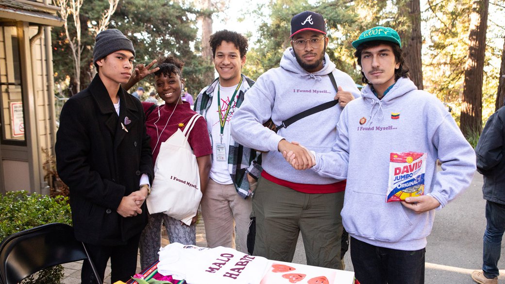 Students pose at the holiday craft fair