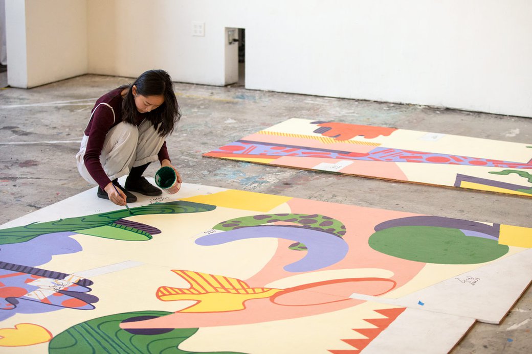 Student working on the ENGAGE! Mural project at CCA.