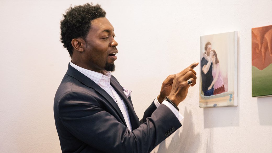 Keith Thomas offers his expert insights to painting students during a critique