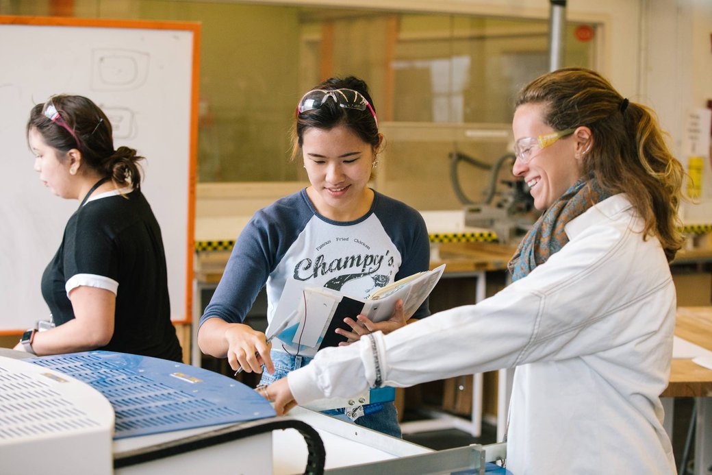 Furniture faculty helps student in mold lab