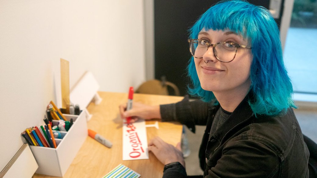 Student at "Take Action / A For Liberties Exhibition at Hubbell galleries