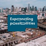 Arial view of the construction of CCA's new Double Ground building with the words "Expanding Possibilities" on it.