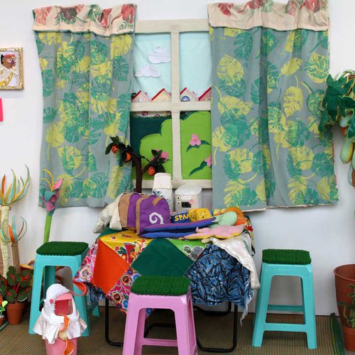 Visual representation of an interior using textiles and mixed media.