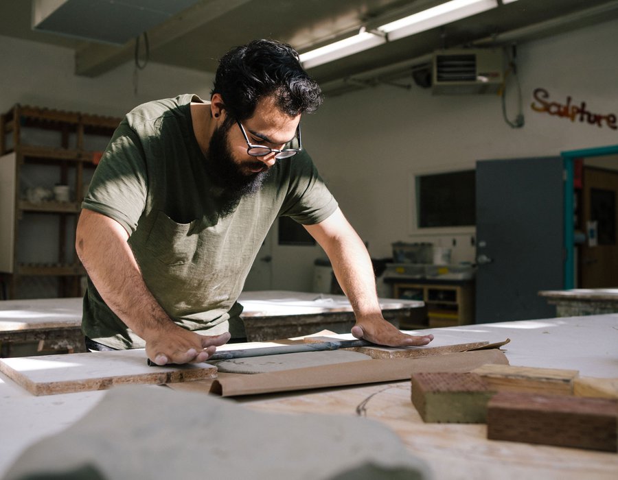 Sculpture student working in the mold studio_hero_MB