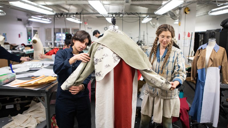 Fashion student adjusts their garment and pattern with the help of faculty_feature_MB