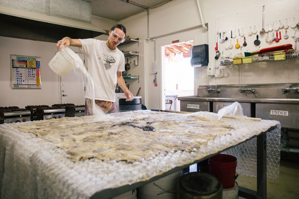 Student working with wool in the Fiber Sculpture Studio