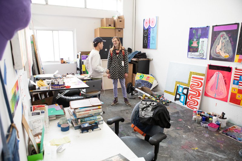 MFA Fine Arts student during a studio visit in their Dogpatch studio space.